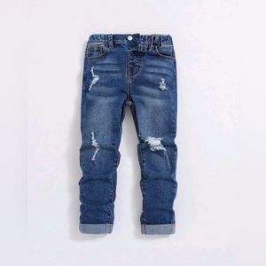 Boy ripped frayed cat scratch jeans